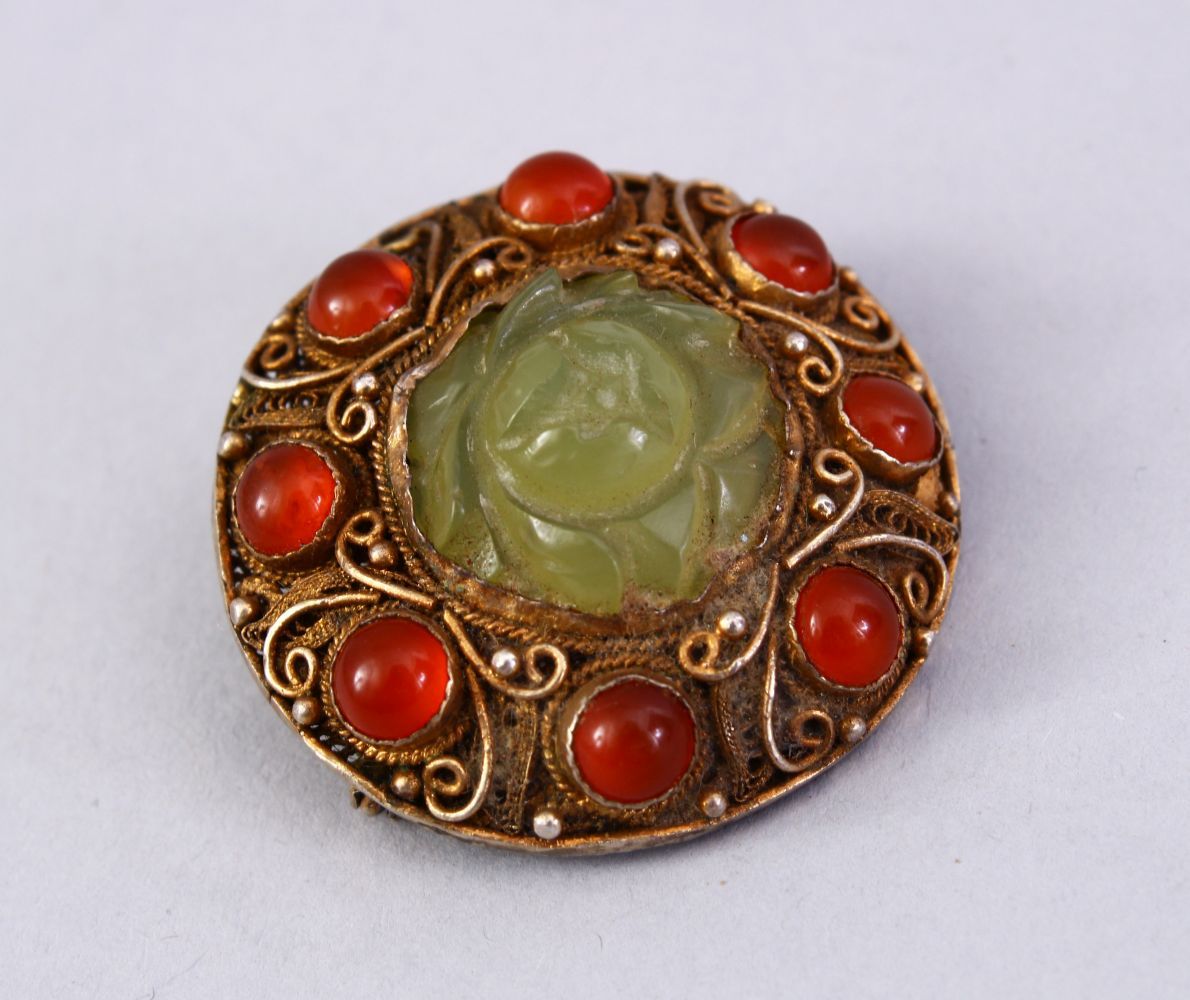 A GOOD INDIAN SILVER GILT & JADE BROOCH, with filigree work enclosing a floral carved jade centre, - Image 2 of 4