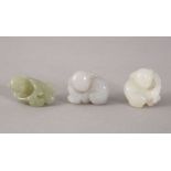 THREE 19TH / 20TH CENTURY CHINESE CARVED WHITE / CELADON JADE FIGURES - BOYS, the carving