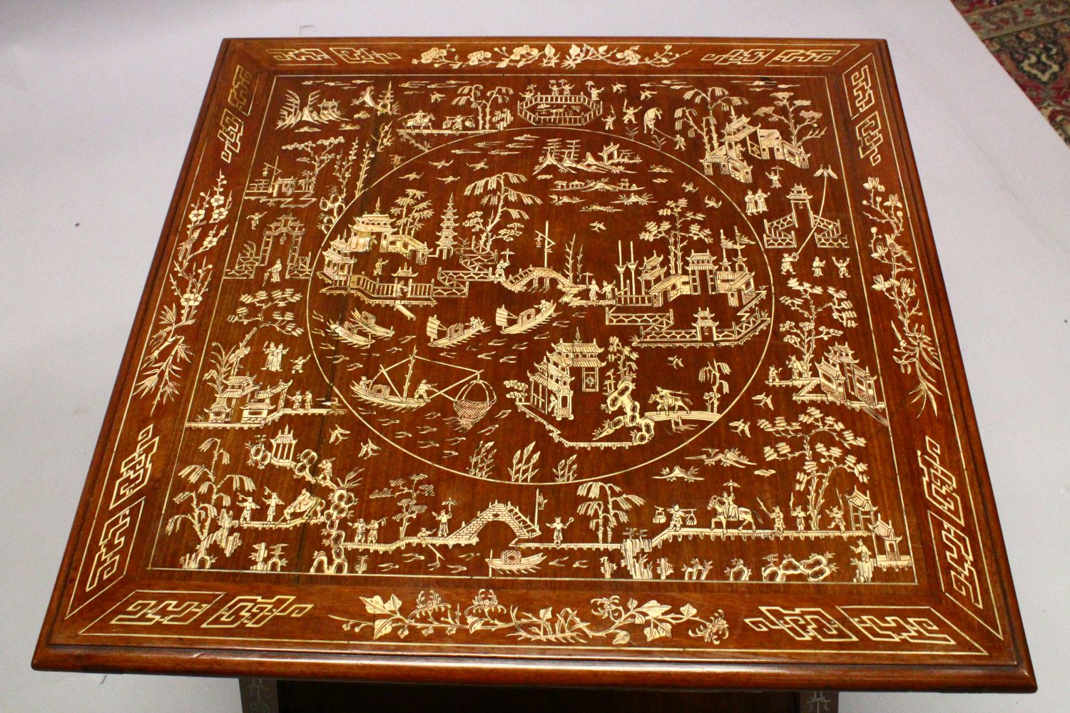 A 19TH / 20TH CENTURY CHINESE BONE INLAID HARDWOOD SQUARE FORMED TABLE, The top inlaid with carved - Image 2 of 4