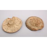 TWO GOOD CARVED CLAY FATIMID TEMPLETS, 9CM.