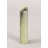 A GOOD 19TH / 20TH CENTURY CHINESE CARVED JADE CYLINDRICAL PENDANT, 8.5cm long