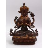 A CHINESE GILT BRONZE FIGURE OF A BUDDHA, In a seated position with highlights of semi precious