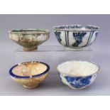 FOUR VARIOUS PERSIAN GLAZED POTTERY BOWLS, largest 19cm diameter.