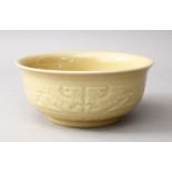 A GOOD CHINESE BISCUIT GROUND PORCELAIN BOWL, the bowl with a biscuit ground and moulded