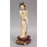 A CHINESE CARVED IVORY POLYCHROMED FIGURE OF GUANYIN, 21cm