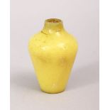 A GOOD 19TH / 20TH CENTURY CHINESE PEKING GLASS SNUFF BOTTLE, the yellow bottle in the baluster