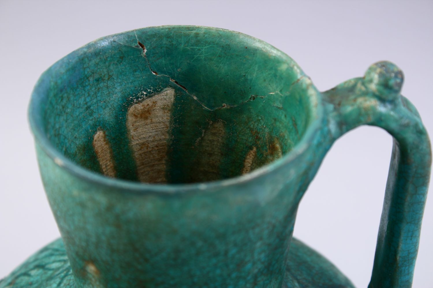 A GOOD EARLY ISLAMIC TURQUOISE GLAZED POTTERY JUG, 22cm high. - Image 7 of 9
