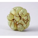 A GOOD CHINESE CARVED JADE ROUNDEL PENDANT - BOYS, the pendant carved with scenes of three boys,