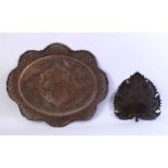 A GOOD LARGE 19TH CENTURY KASHMIRI OPENWORKED COPPER TRAY OF LOBED DESIGN, together with a similar
