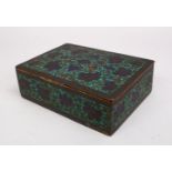 A 19TH CENTURY INDIAN KASHMIRI ENAMELLED COPPER BOX, with decoration of formal scrolling foliage,