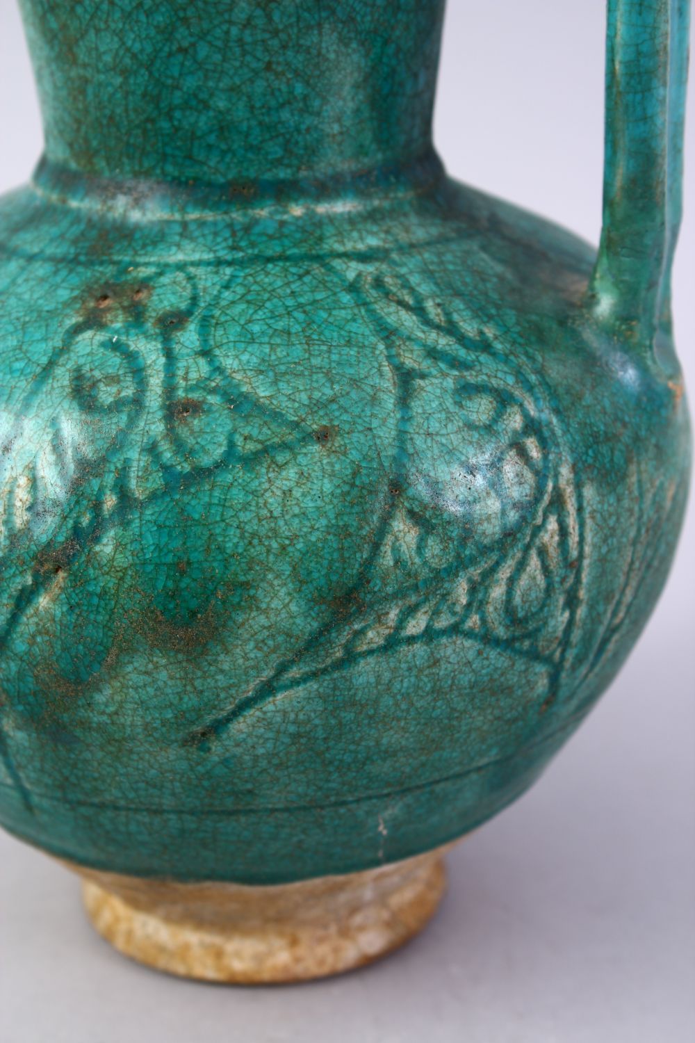 A GOOD EARLY ISLAMIC TURQUOISE GLAZED POTTERY JUG, 22cm high. - Image 5 of 9