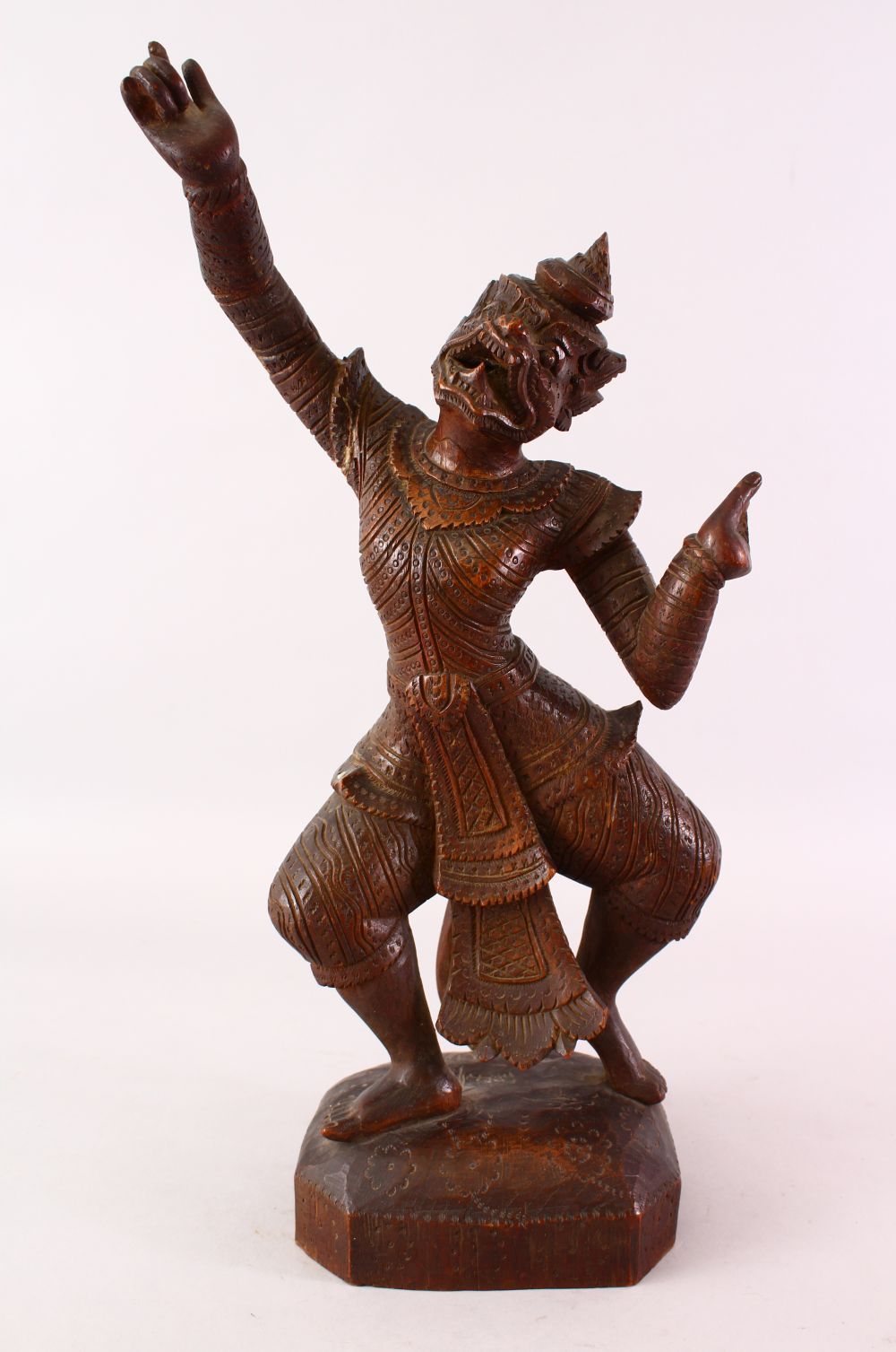 A GOOD 19TH CENTURY OR EARLIER BURMESE CARVED WOODEN FIGURE OF A DEITY, 48cm high.