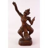 A GOOD 19TH CENTURY OR EARLIER BURMESE CARVED WOODEN FIGURE OF A DEITY, 48cm high.