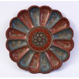 A 19TH CENTURY INDIAN ENAMELLED BRASS DISH, of lobed design, with pierced and engraved centre,