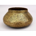 A GOOD 19TH CENTURY DAMASCUS BRASS CARVED BOWL, the bowl carved with formal floral motif, 25cm.