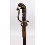 A GOOD 19TH CENTURY INDONESIAN STEEL SWORD, with a wooden carved mythical head hilt, 70cm.