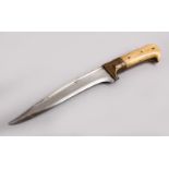 A GOOD INDIAN BONE HILTED DAGGER, 25cm.