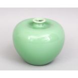 A CHINESE PALE GREEN PORCELAIN BRUSH WASH, 11CM.