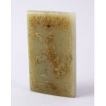 A GOOD CHINESE CARVED JADE PENDANT CARVED WITH SCENES OF BOYS PLAYING, the main panel depicting