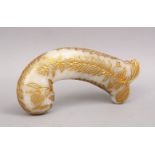 A GOOD INDIAN MUGHAL / ISLAMIC CARVED JADE & GILT DAGGER HANDLE, the handle incised with gilt,