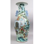 A FINE QUALITY CHINESE DAOGUANG PERIOD FAMILLE ROSE PORCELAIN WARRIOR VASE, the body of the vase