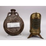 TWO GOOD BRASS & STONEWARE JEWISH RELATED ITEMS, one flask shaped stone bottle with silver inlays,
