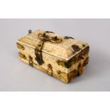 AN 18TH CENTURY MUGHAL INDIAN CARVED IVORY BOX WITH METAL MOUNTS, carved with floral decoration,