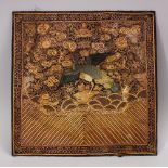 A CHINESE EMBROIDERED TEXTILE PANEL, depicting phoenix birds in landscapes with waves, mounted to
