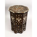A 19TH CENTURY MOORISH CARVED HARDWOOD OCTAGONAL INLAID OCCASIONAL TABLE, inlaid with mother of