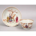 AN 18TH CENTURY CHINESE FAMILLE ROSE PORCELAIN CUP & SAUCER, with floral decoration, 11.5cm & 8cm.