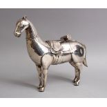 A FINE 19TH CENTURY COLONIAL OR SOUTH AMERICAN SOLID SILVER MODEL OF A HORSE, 26CM WIDE X 22 HIGH