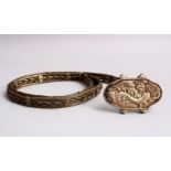 AN ORIENTAL WHITE METAL / SILVER BELT, with embossed decoration of mythical animals, 110cm open,