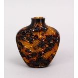 A CHINIESE TURTLE SHELL SNUFF BOTTLE, with openwork carved dragons, 6cm.