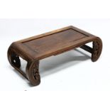 A 19TH CENTURY CHINESE HARDWOOD SCROLL END OPIUM TABLE, with open ends and carved frieze, 32cm