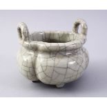 A GOOD CHINESE QUATREFOIL CRACKLE GLAZE TWIN HANDLE PORCELAIN CENSER, the base with four moulded