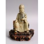 A CHINESE CARVED SOAPSTON E FIGURE OF A GENERAL SEATED, AF, 14CM HIGH.