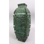 A CHINESE BRONZE ARCHAIC STYLE VASE, carved with archaic design, 37cm high.