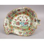 A 19TH CENTURY CHINESE CANTON FAMILLE ROSE PORCELAIN LEAF SHAPED DISH, the dish decorated with