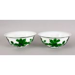 A PAIR OF 19TH CENTURY CHINESE PEKING GLASS OVERLAY BOWLS, with green overlay depicting blossom,18cm