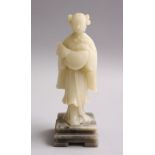 A GOOD CHINESE CARVED WHITE JADE FIGURE OF A GODDESS HOLDING A FISH, on a carved hardstone base,