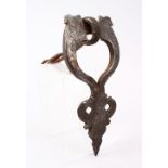 A 17TH / 18TH CENTURY PERSIAN SAFAVID STEEL DOOR KNOCKER, with calligraphy, 24cm