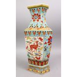 A CHINESE FAMILLE ROSE PORCELAIN VASE, with formal floral decoration upon turquoise ground, with