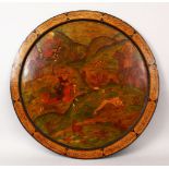 A GOOD 19TH CENTURY PERSIAN PAPIER MACHE PAINTED ROUND PANEL, with calligraphy reading " ali
