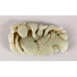 A GOOD 19TH / 20TH CENTURY CHINESE CARVED CELADON JADE PENDANT OF A GODDESS, the goddess recumbent