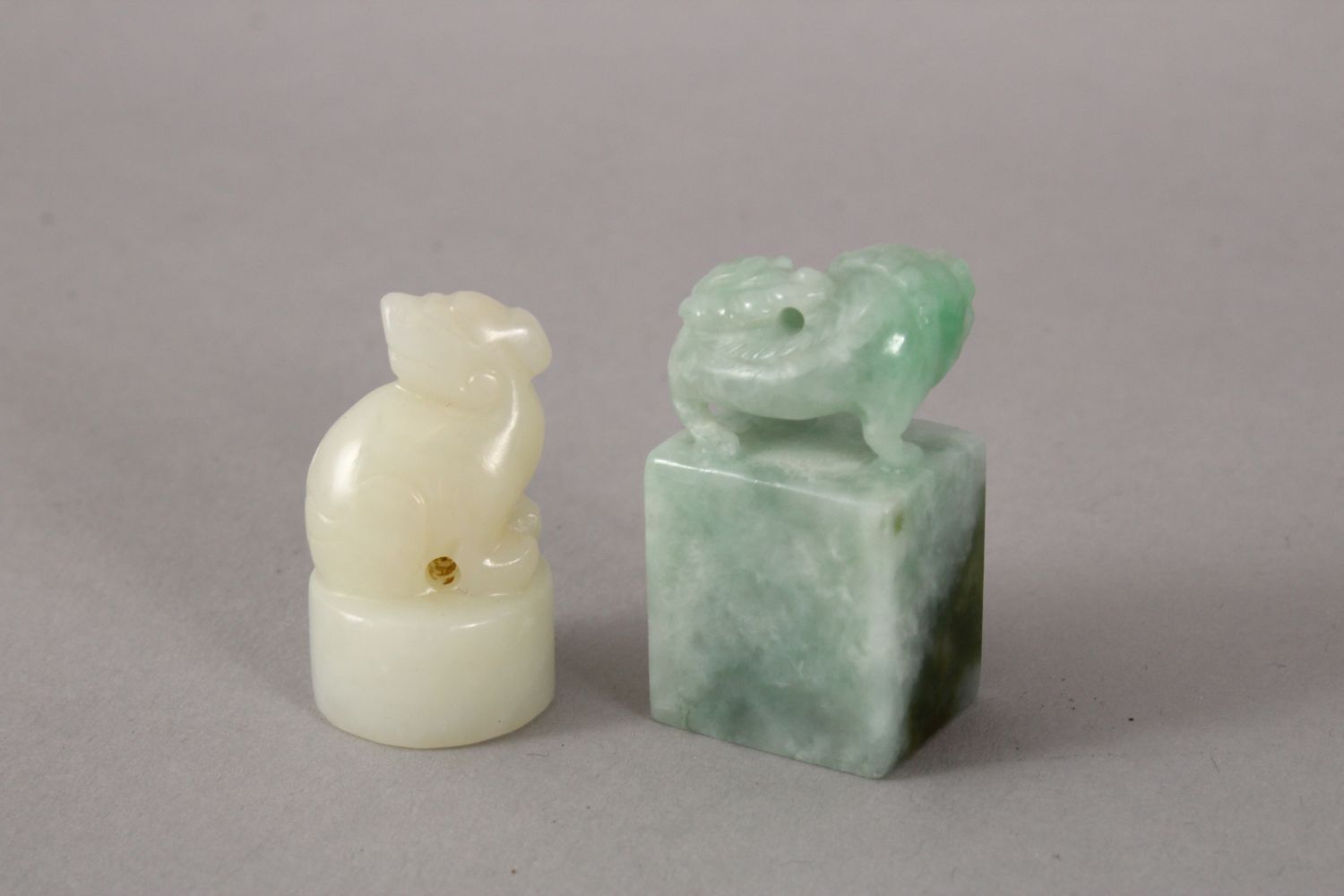 TWO 19TH / 20TH CENTURY CHINESE CARVED JADE / JADEITE SEALS, one white jade depicting a kylin, the - Image 2 of 3