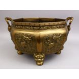 A GOOD CHINESE 19TH CENTURY BRONZE JARDINIERE, the body of the planter with embossed panels of