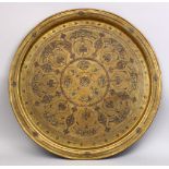 A LARGE 19TH CENTURY SYRIAN BRASS INLAID CALLIGRAPHIC TRAY, inlaid with calligraphy 70cm.