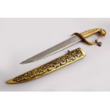 A FINE INDIAN GILT METAL DAGGER WITH WATERED STEEL BLADE, with floral carved sheath and hilt, 30cm.