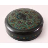 A GOOD 19TH / 20TH CENTURY INDIAN KASHMIR CYLINDRICAL LACQUER BOX, decorated with flora and an
