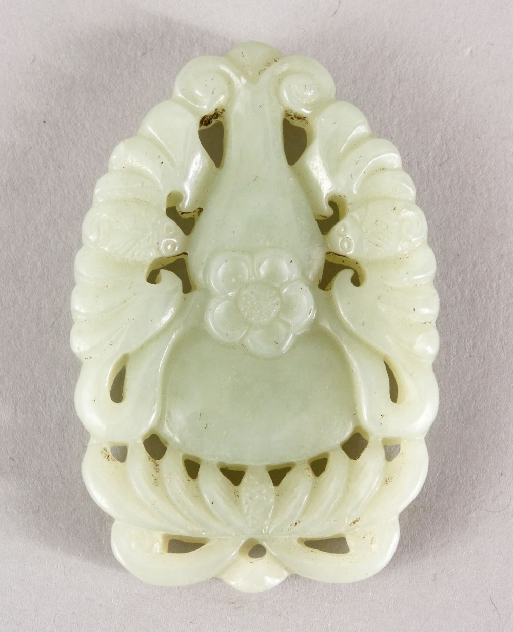 A GOOD 19TH / 20TH CENTURY CHINESE CARVED CELADON JADE PENDANT - DOUBLE GOURD, a double gours sat